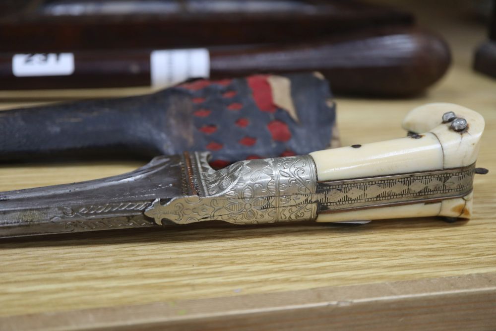 A 19th century Eastern bone handled dagger, length excluding scabbard 34.5cm